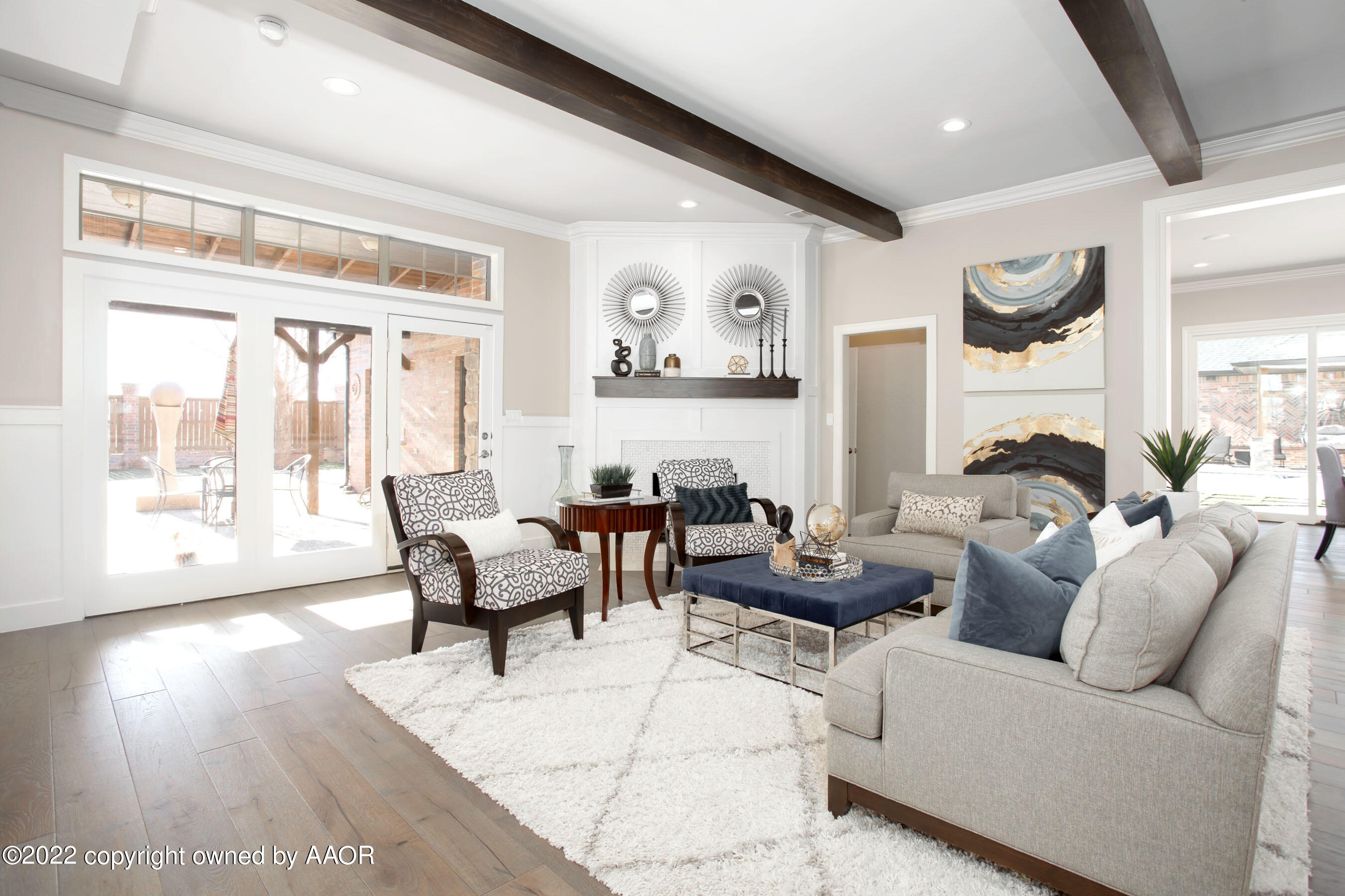 9101 Blackhawk Road Amarillo, TX 79119 - Photo 26 of 73 a living room with furniture and a large window