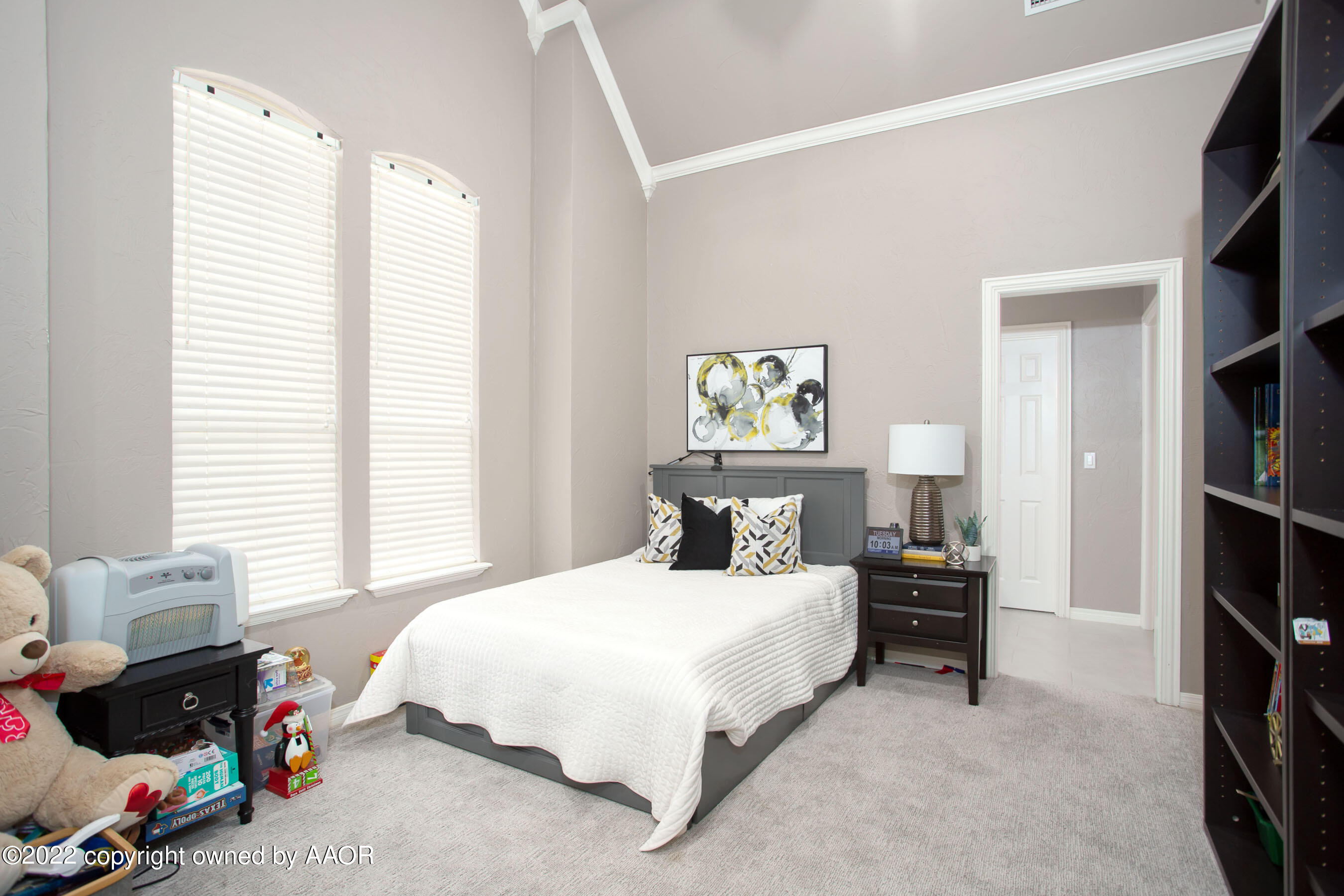 9101 Blackhawk Road Amarillo, TX 79119 - Photo 28 of 73 a bedroom with a bed furniture and a window