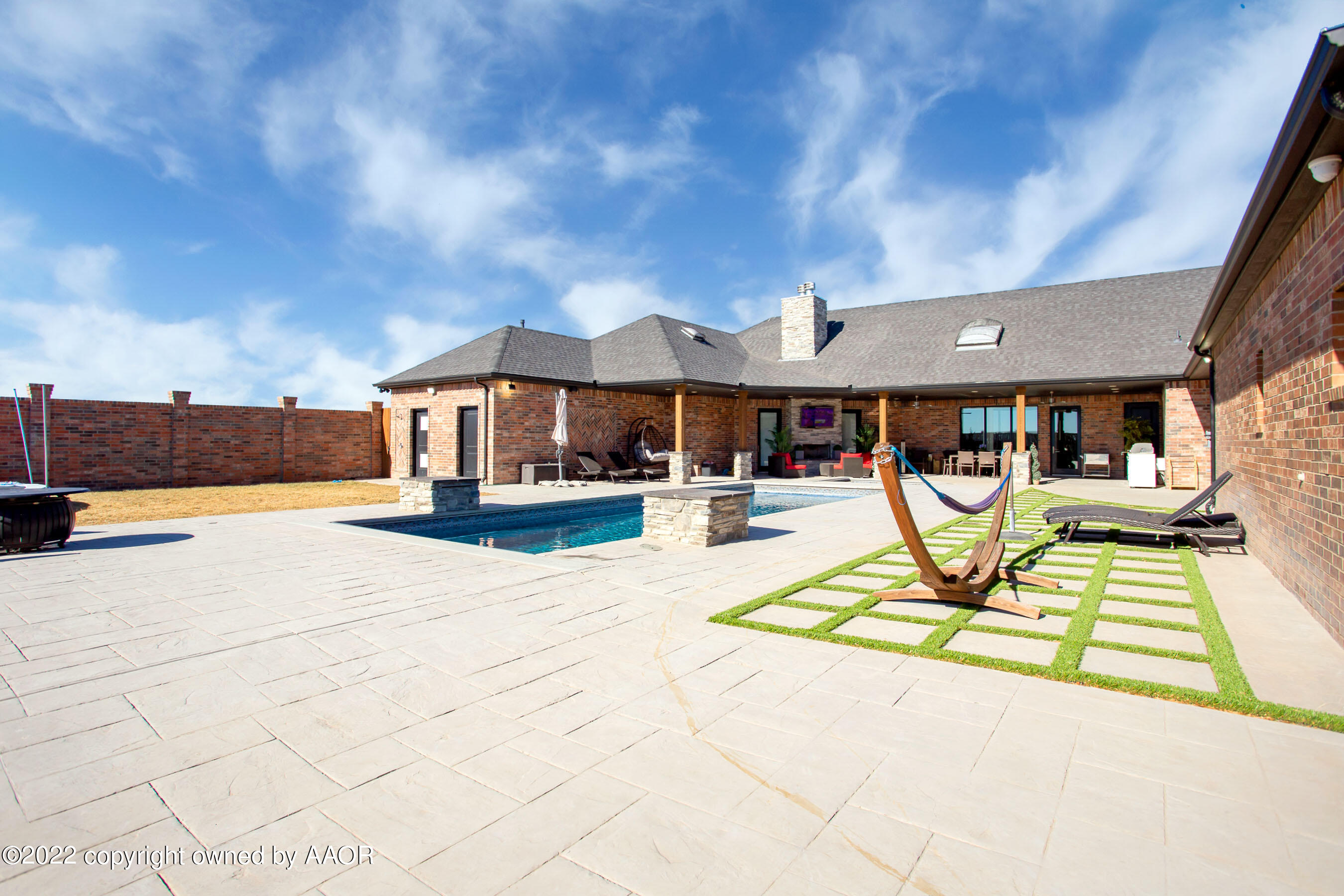 9101 Blackhawk Road Amarillo, TX 79119 - Photo 63 of 73 a view of a swimming pool with a patio