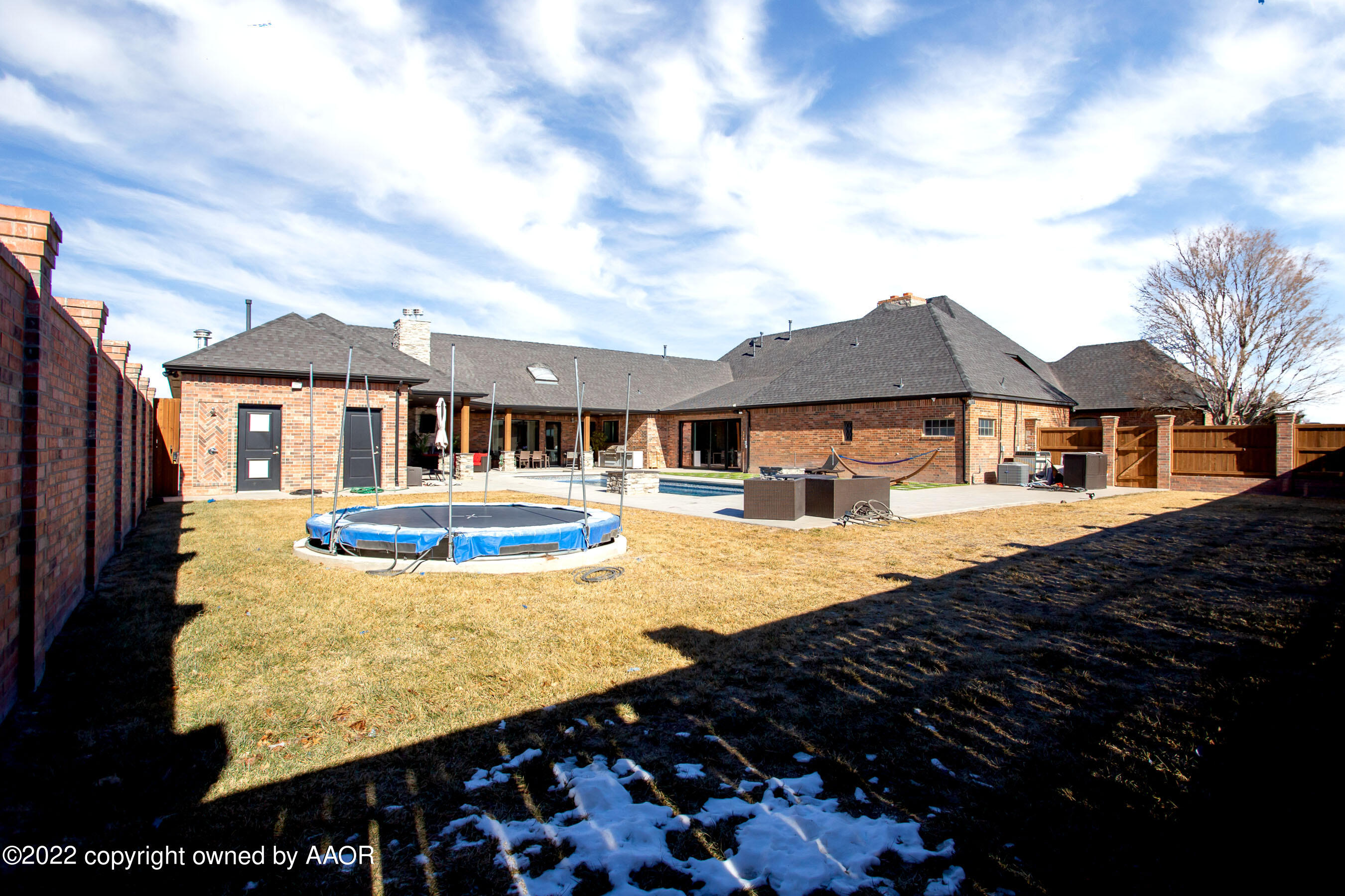 9101 Blackhawk Road Amarillo, TX 79119 - Photo 64 of 73 a front view of a house with a yard