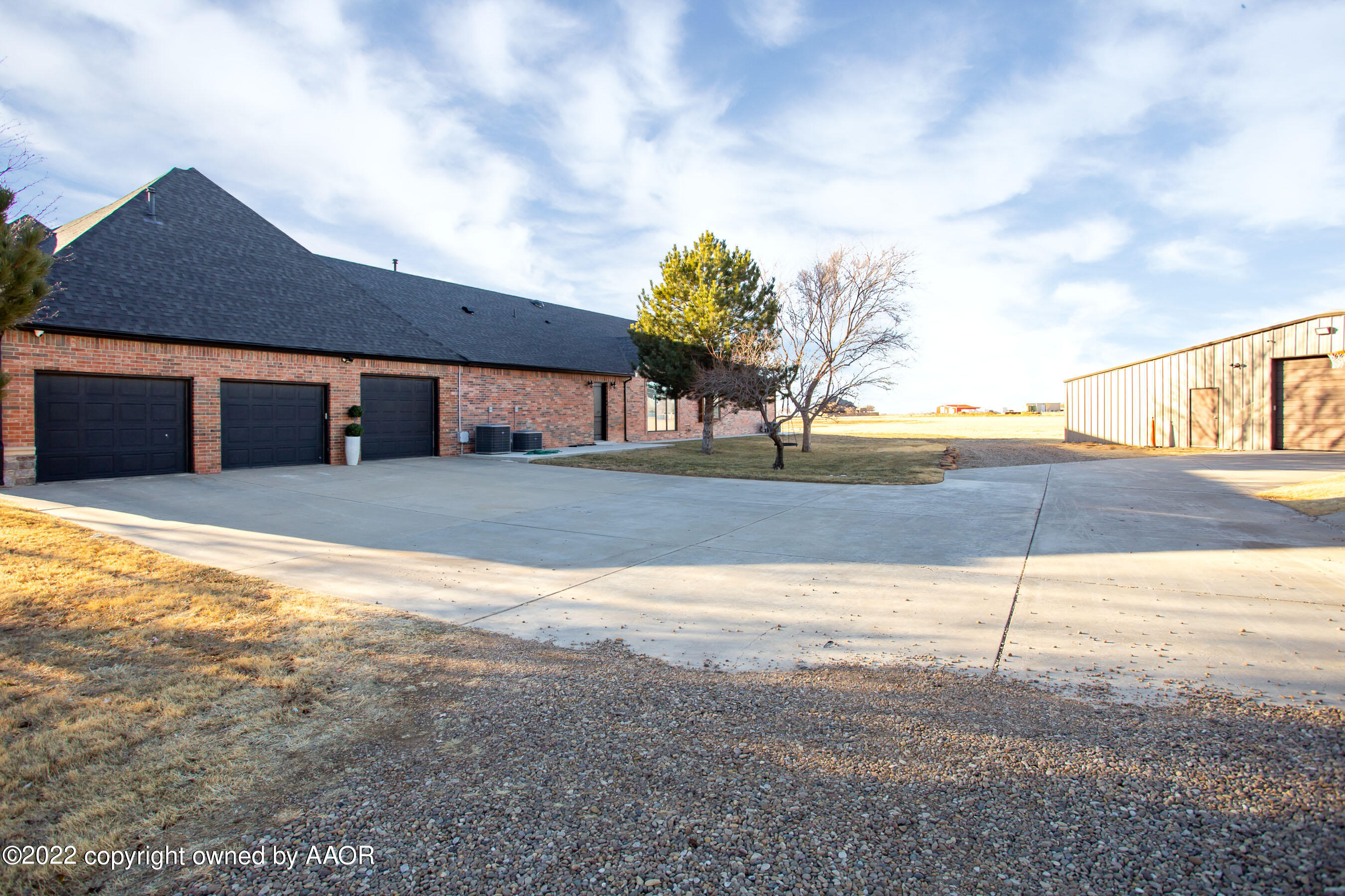 9101 Blackhawk Road Amarillo, TX 79119 - Photo 7 of 73 a view of a house with a yard