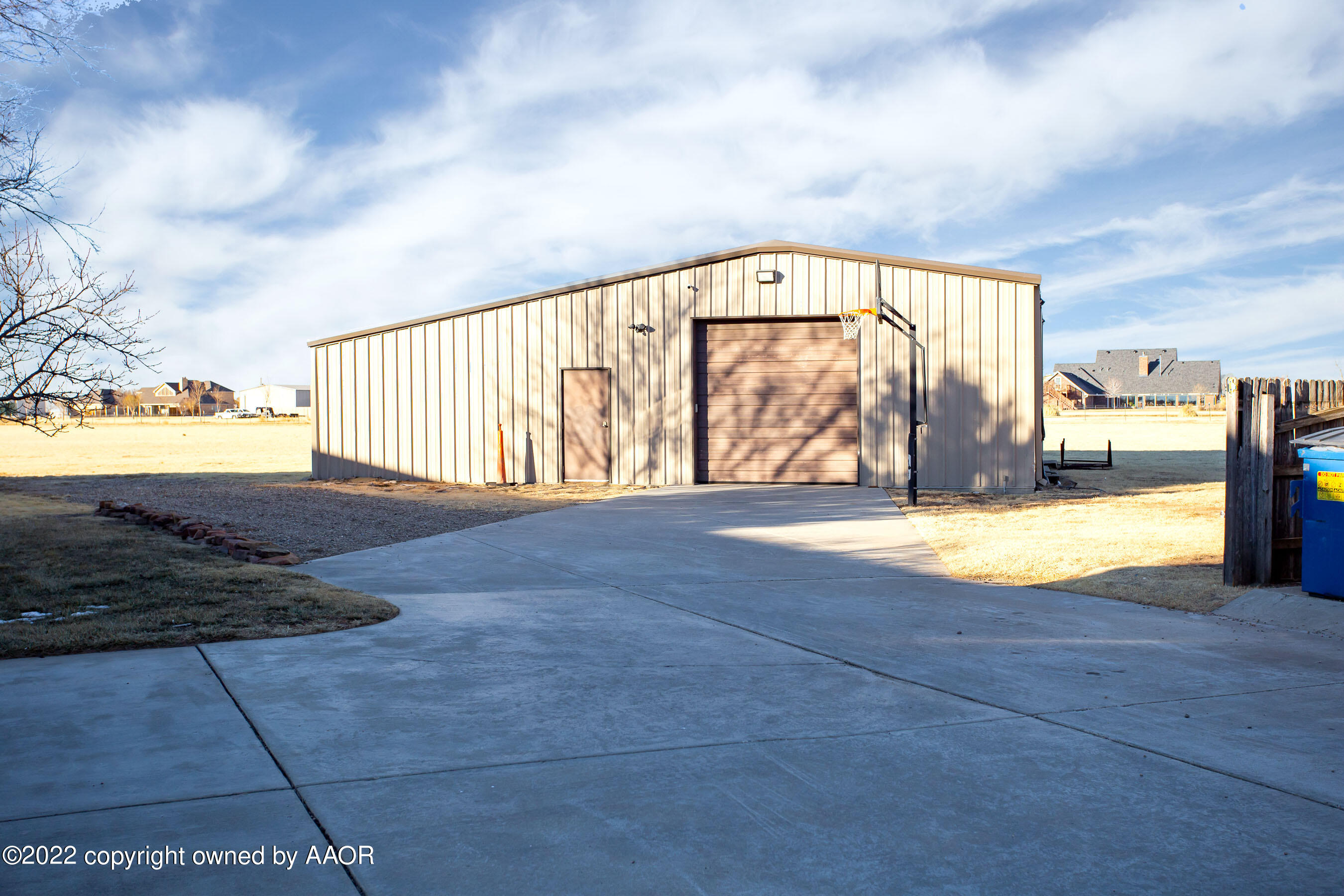 9101 Blackhawk Road Amarillo, TX 79119 - Photo 8 of 73 a view of swimming pool with an outdoor space and seating area