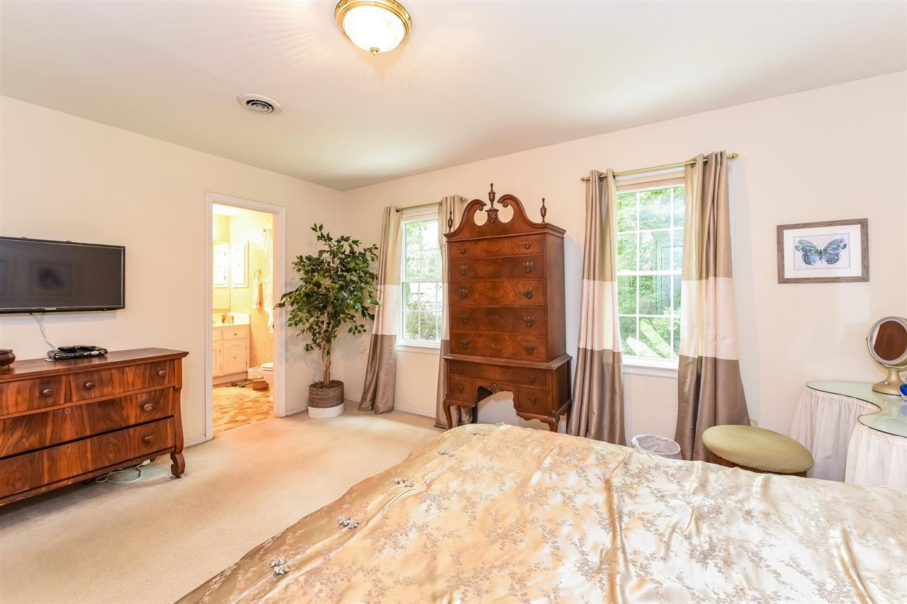9716 Rock Creek Road Raleigh, NC 27613 - Photo 17 of 25 Master Bedroom Opening into Master Bath