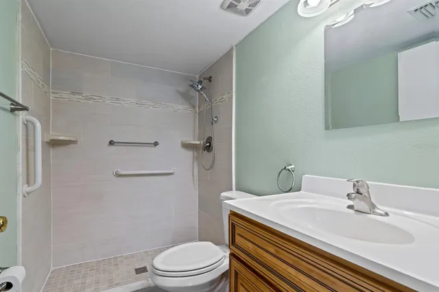 a view of a swimming pool with a yard