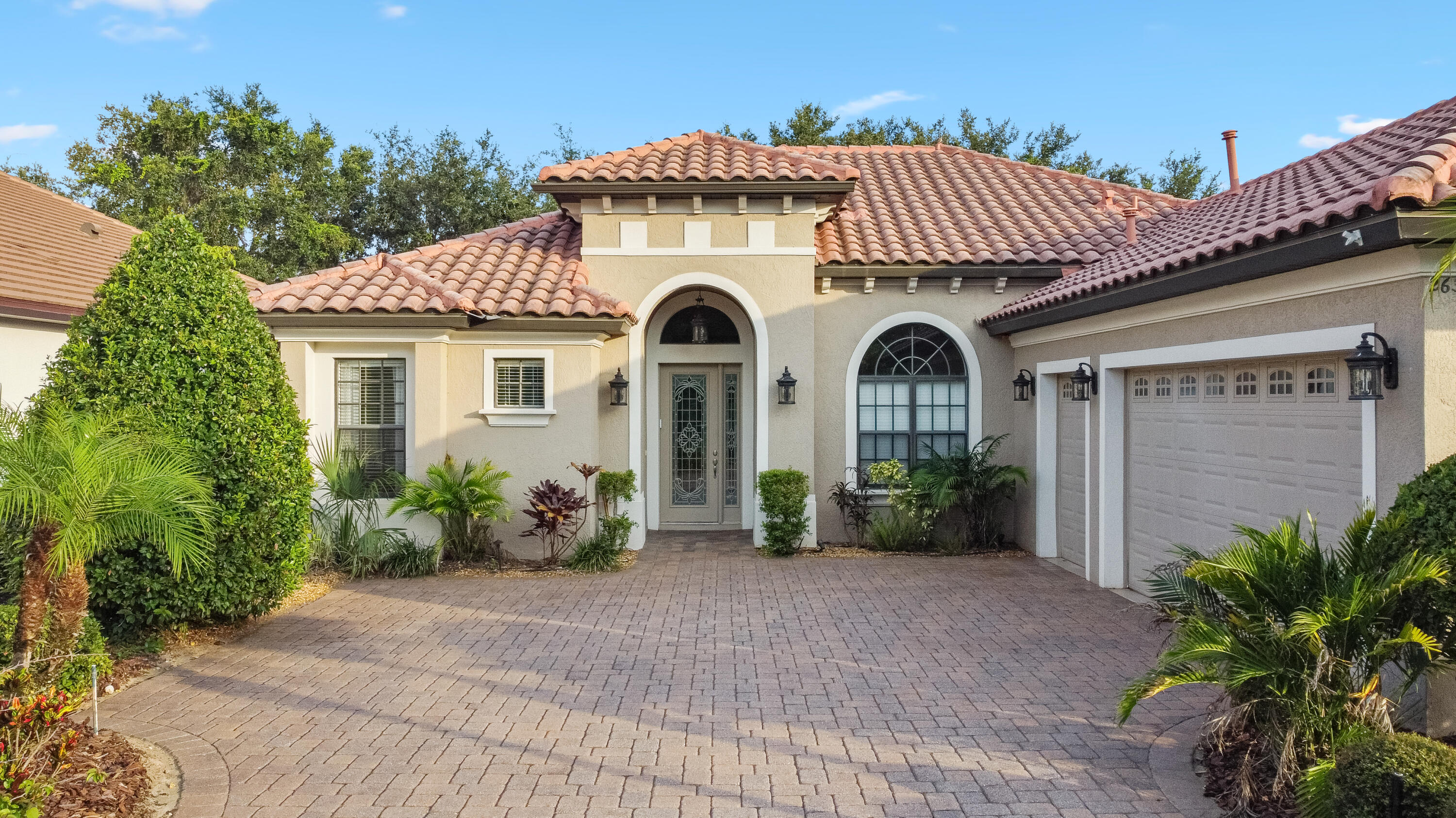 26345 San Gabriel Howey-in-the-Hills, FL 34737 - Photo 1 of 51 a front view of a house with garden