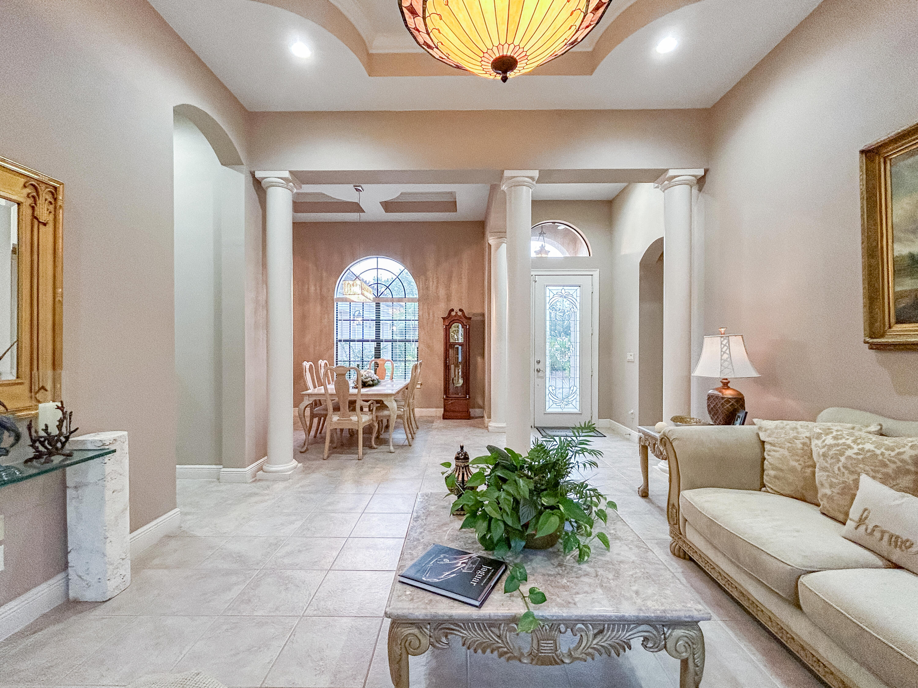 26345 San Gabriel Howey-in-the-Hills, FL 34737 - Photo 14 of 51 a living room with furniture and a large window