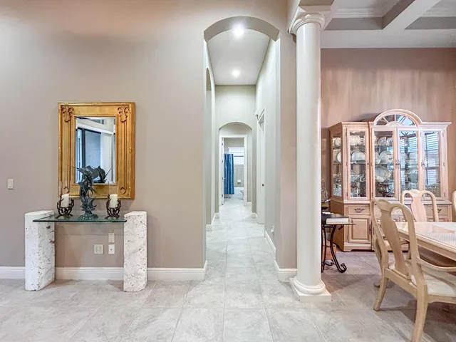 a view of a livingroom with furniture and front door