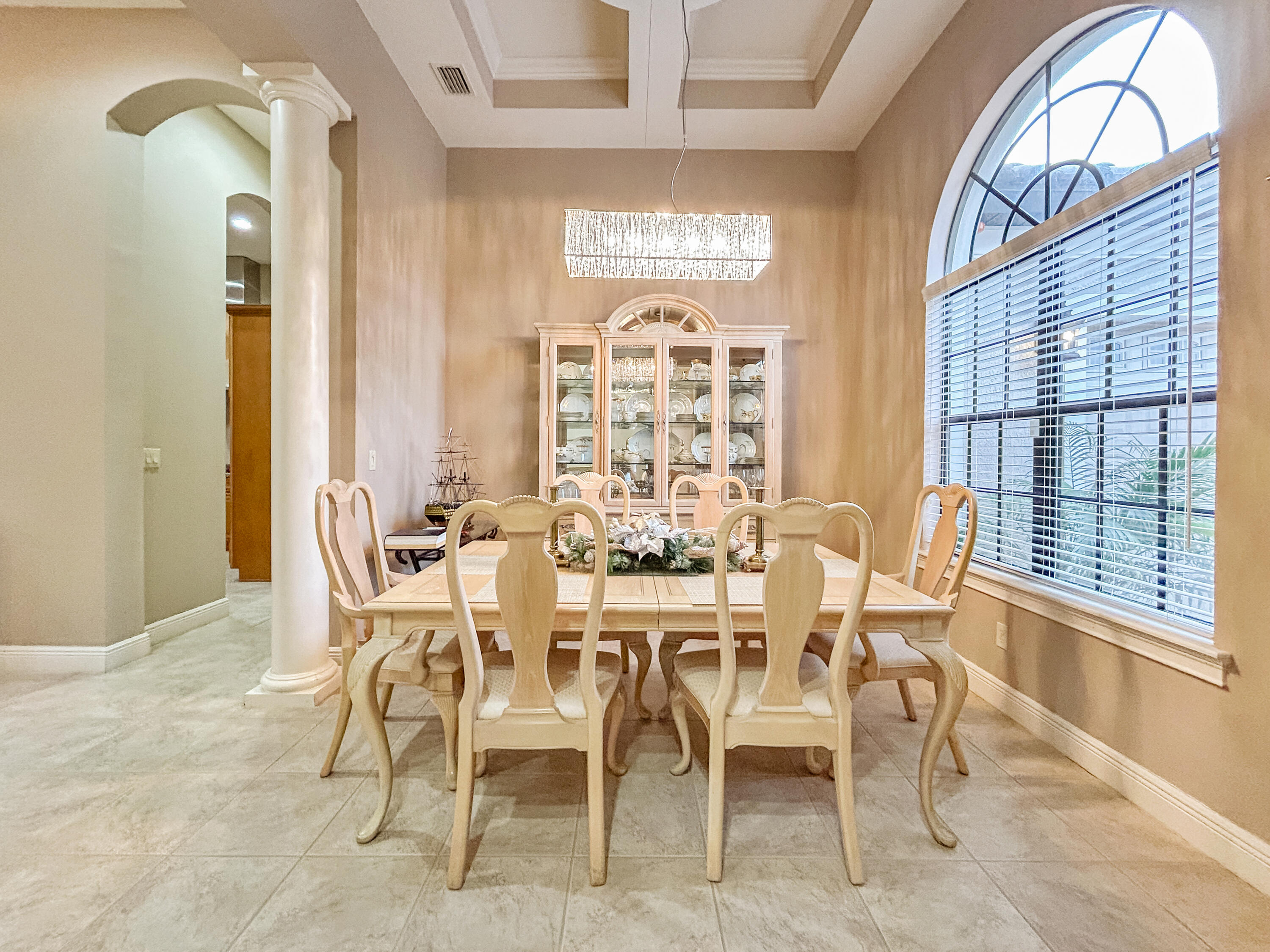 26345 San Gabriel Howey-in-the-Hills, FL 34737 - Photo 16 of 51 a view of a dining room with furniture window and outside view