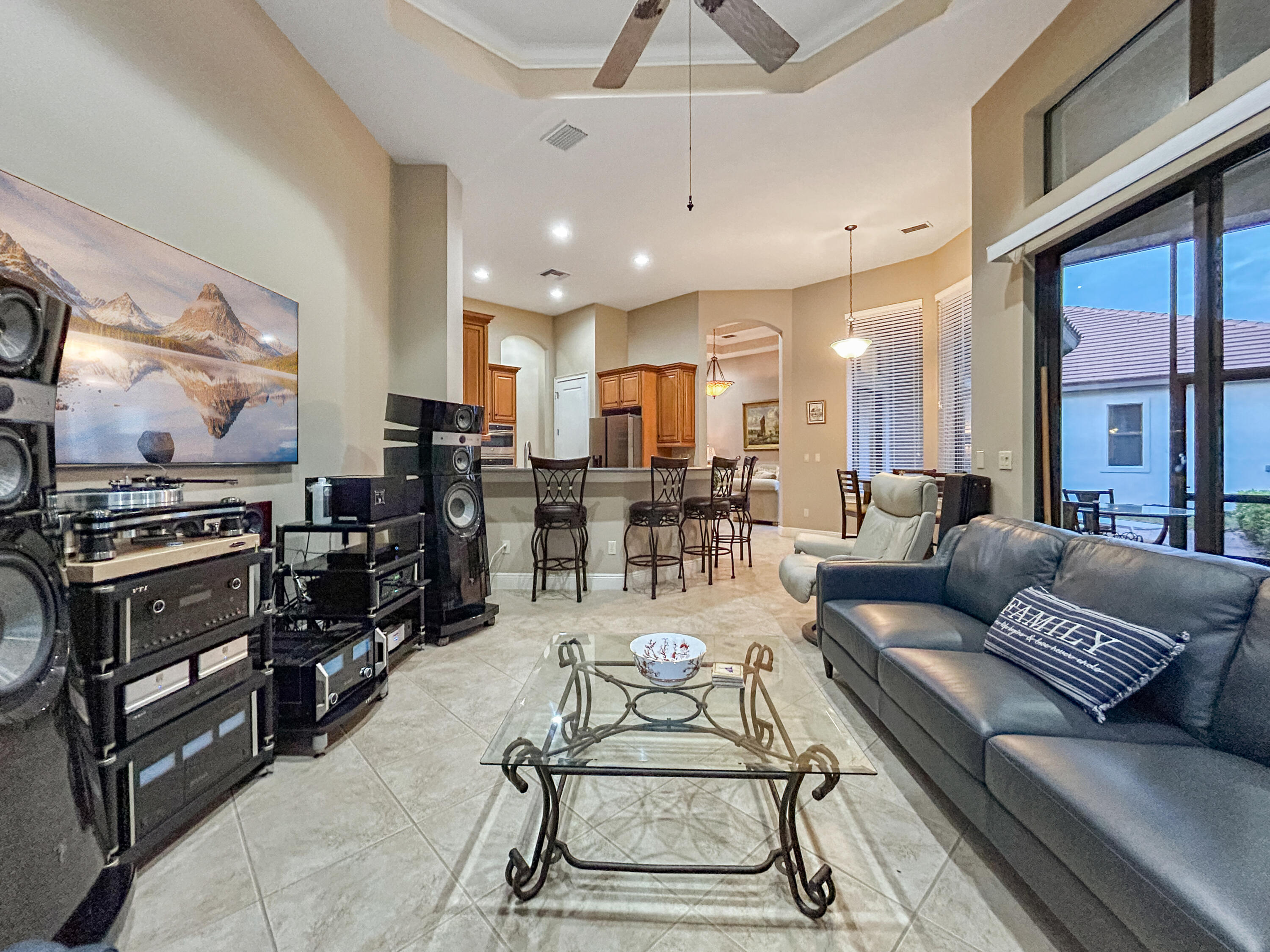26345 San Gabriel Howey-in-the-Hills, FL 34737 - Photo 29 of 51 a living room with furniture kitchen view and a large window