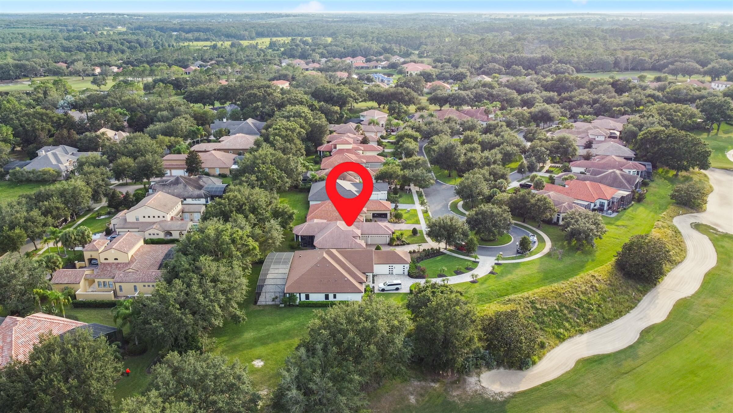 26345 San Gabriel Howey-in-the-Hills, FL 34737 - Photo 51 of 51 an aerial view of residential house with yard and mountain view in back