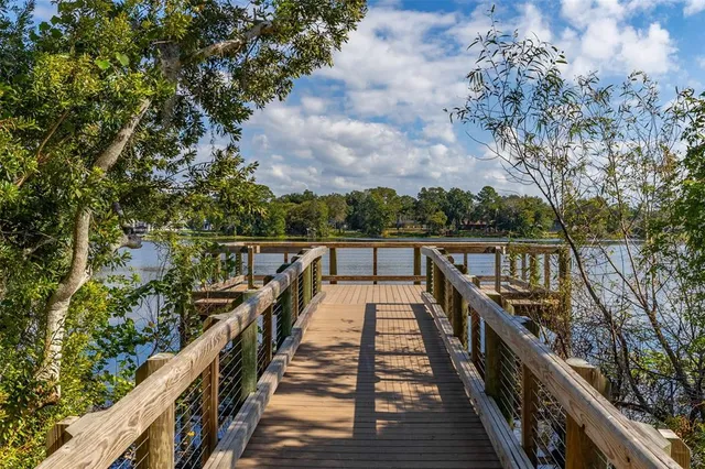 a view of a lake with a big yard