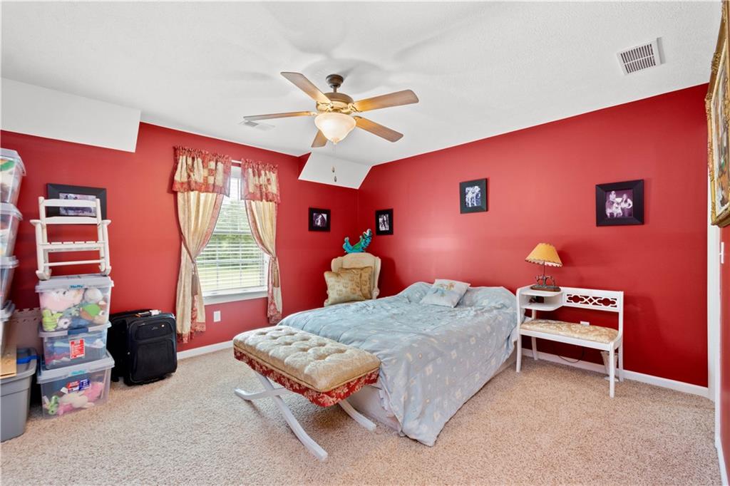 70 Barr Road Finleyville, PA 15332 - Photo 12 of 25 a bedroom with a bed and a chandelier