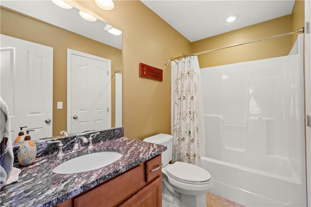 70 Barr Road Finleyville, PA 15332 - Photo 15 of 25 a bathroom with a granite countertop sink toilet and shower