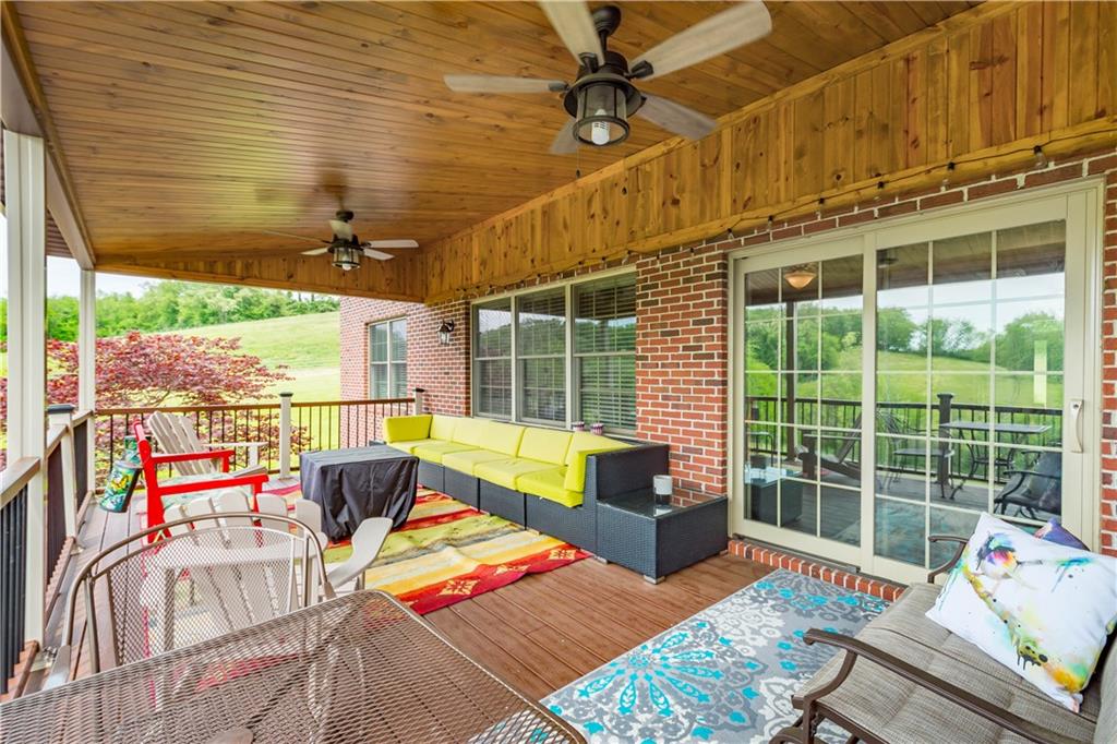 70 Barr Road Finleyville, PA 15332 - Photo 19 of 25 a balcony with furniture and a potted plant