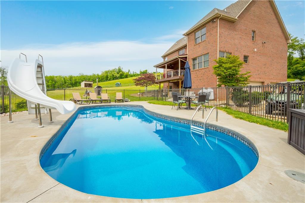 70 Barr Road Finleyville, PA 15332 - Photo 20 of 25 a view of a swimming pool with a lounge chairs