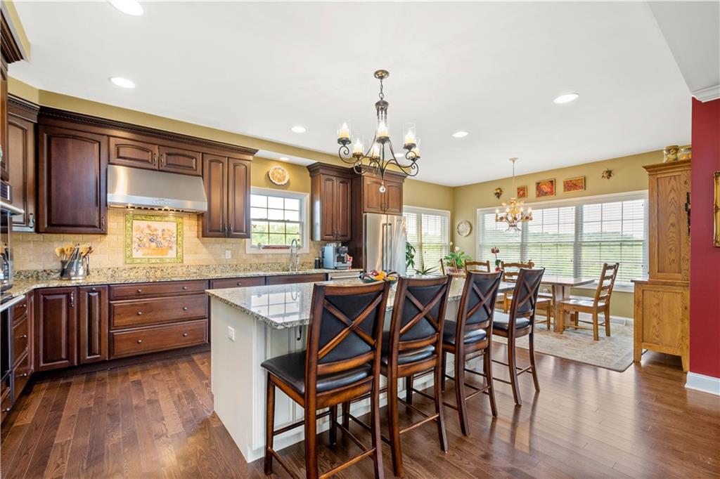 70 Barr Road Finleyville, PA 15332 - Photo 3 of 25 a view of a dining room with furniture window and wooden floor