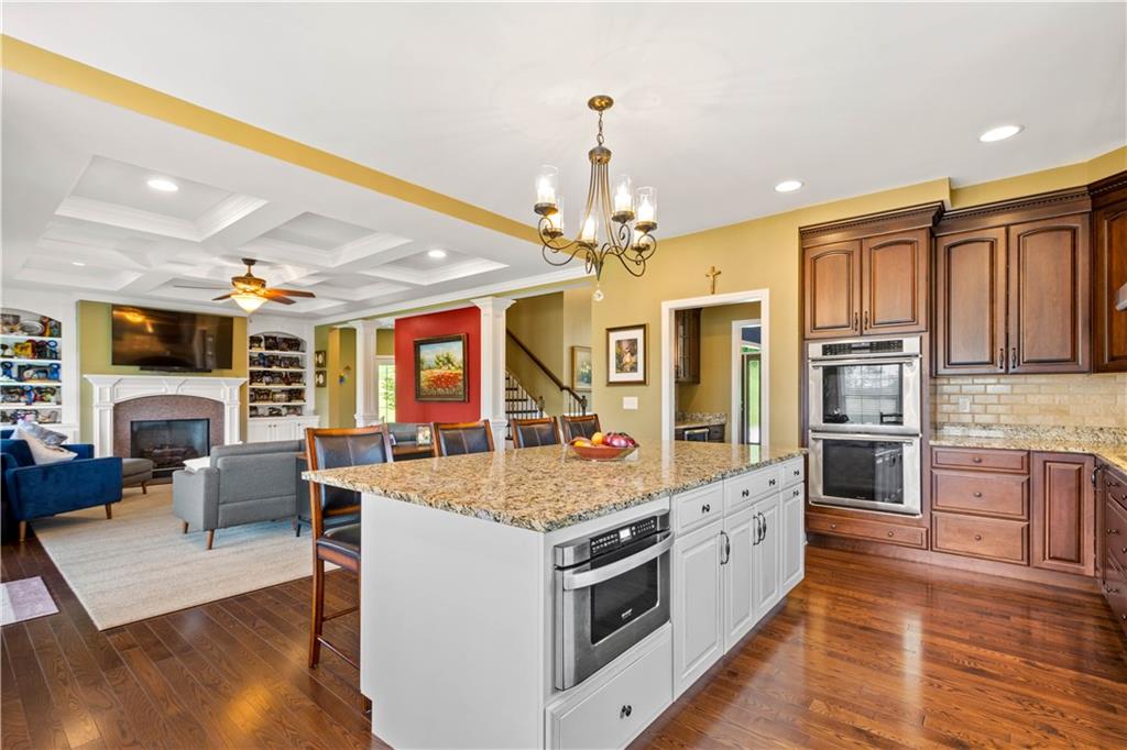 70 Barr Road Finleyville, PA 15332 - Photo 4 of 25 a large kitchen with stainless steel appliances granite countertop a stove and cabinets