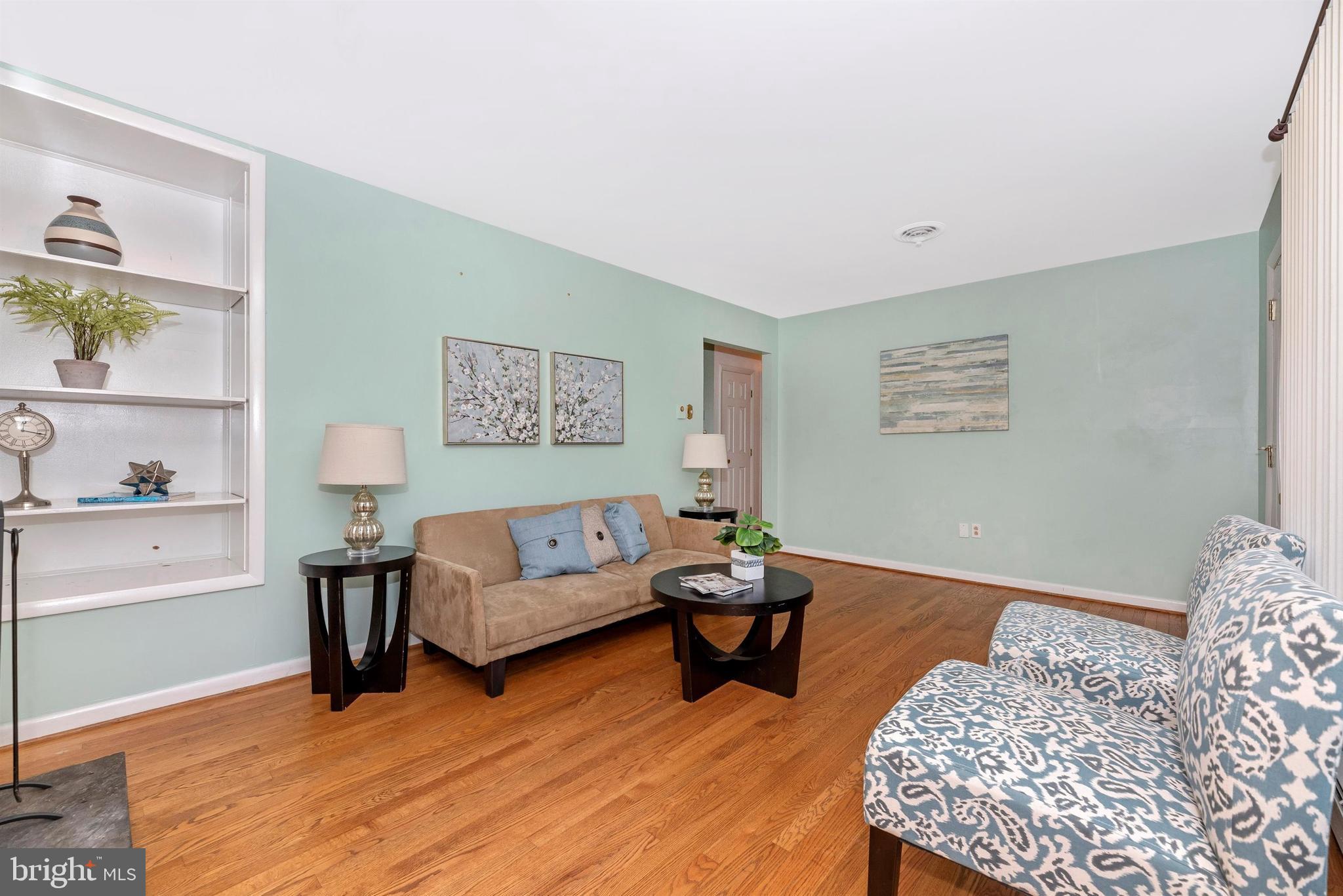 7716 McKaig Road Frederick, MD 21701 - Photo 10 of 47 LIVING ROOM W/ BUILT IN SHELVING