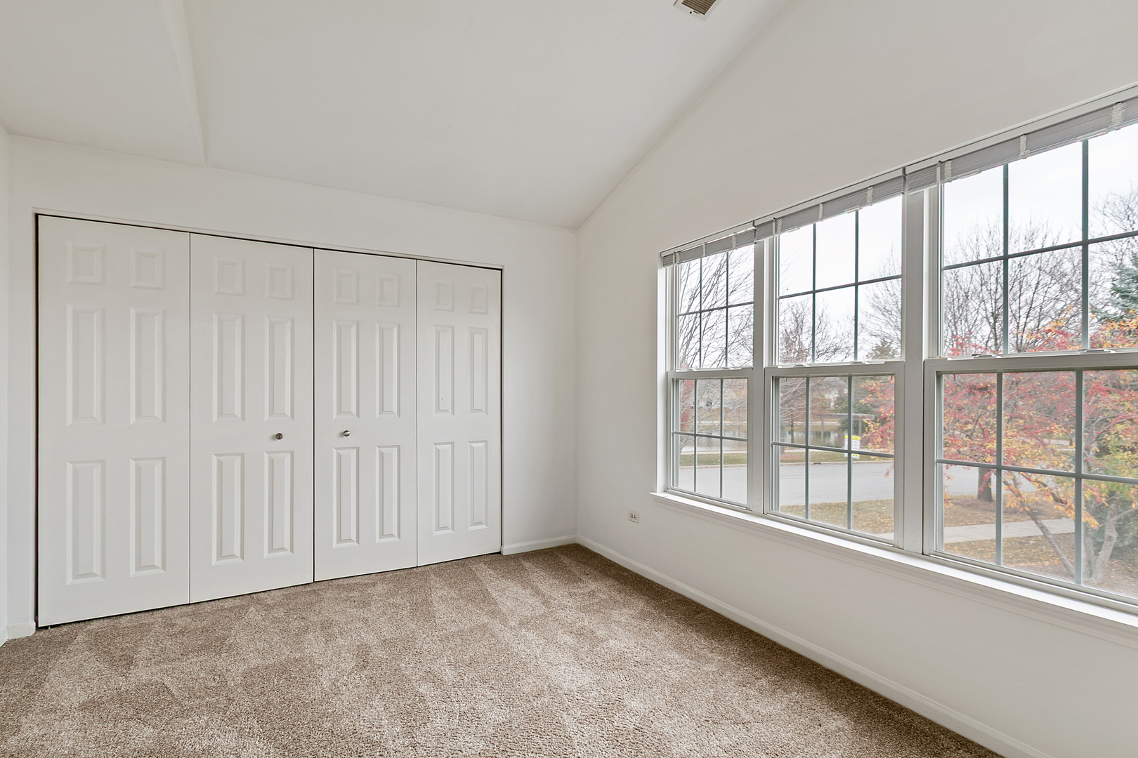 2604 Sheehan Court, Unit 204 Naperville, IL 60564 - Photo 13 of 19 a view of an empty room with a window