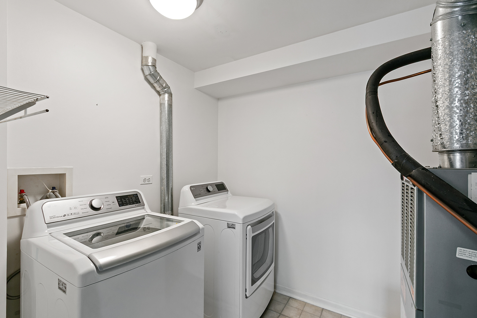 2604 Sheehan Court, Unit 204 Naperville, IL 60564 - Photo 16 of 19 a utility room with dryer and washer