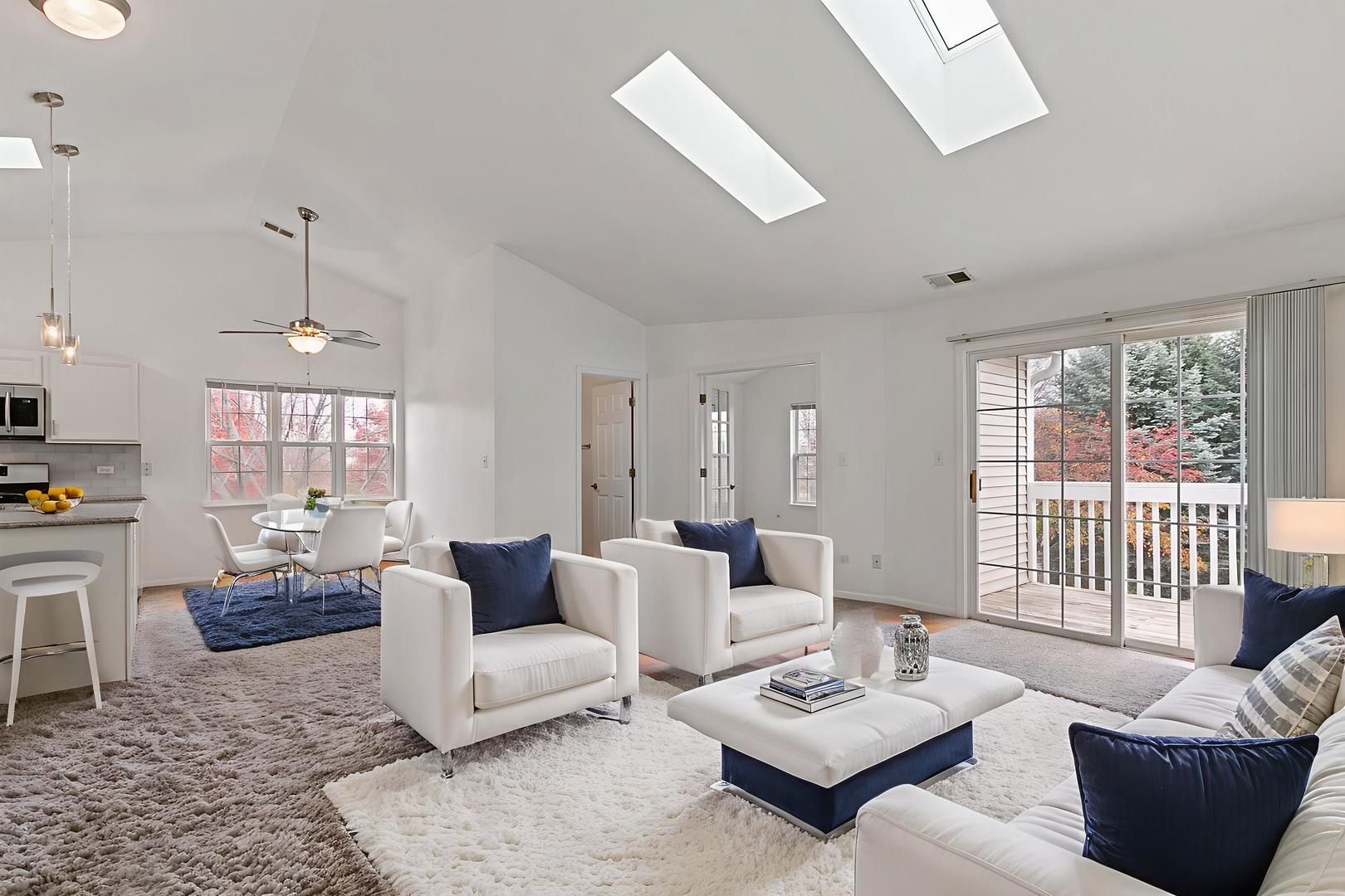 2604 Sheehan Court, Unit 204 Naperville, IL 60564 - Photo 5 of 19 a living room with furniture and a large window