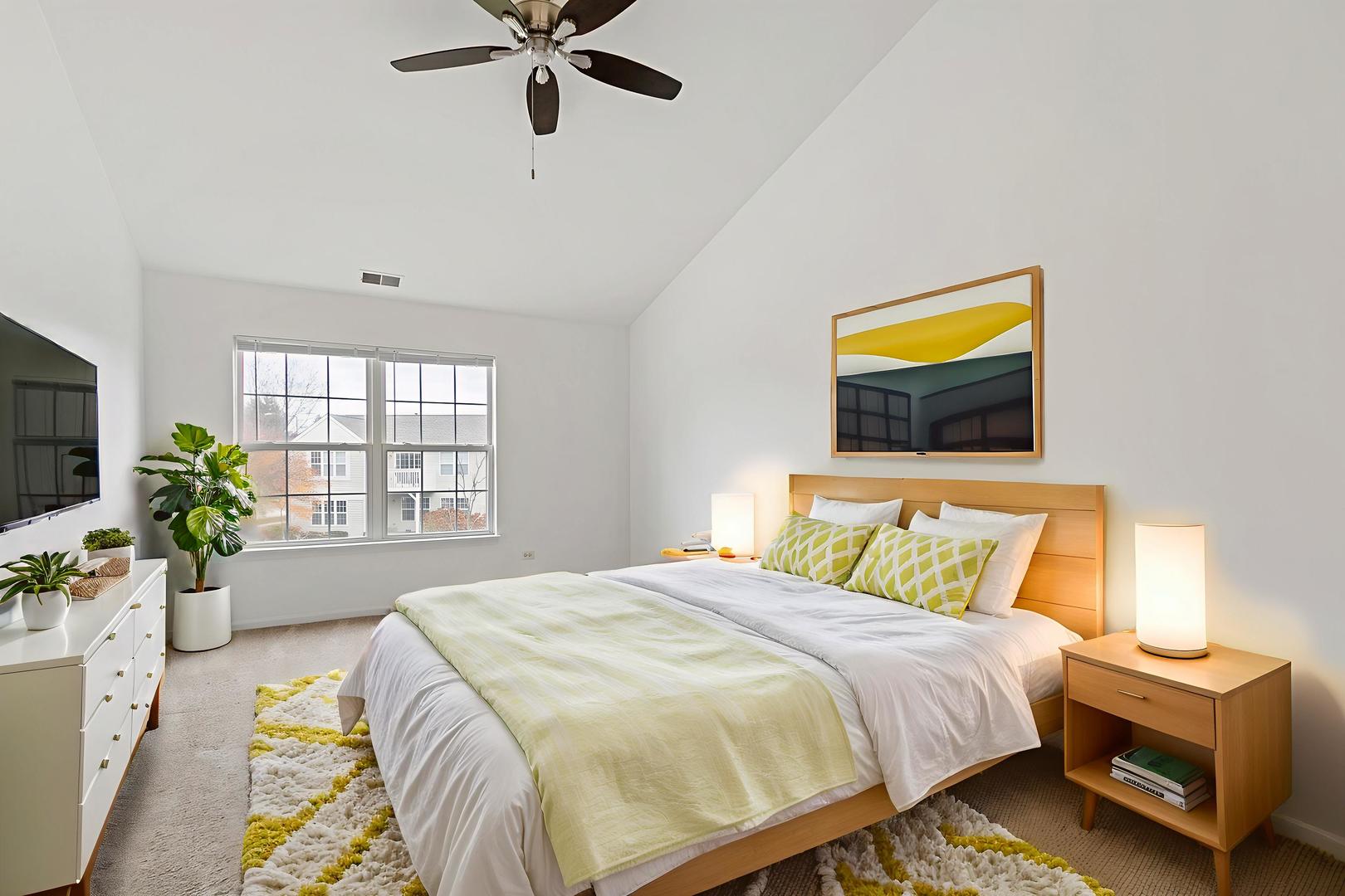 2604 Sheehan Court, Unit 204 Naperville, IL 60564 - Photo 9 of 19 a bedroom with a bed and a potted plant