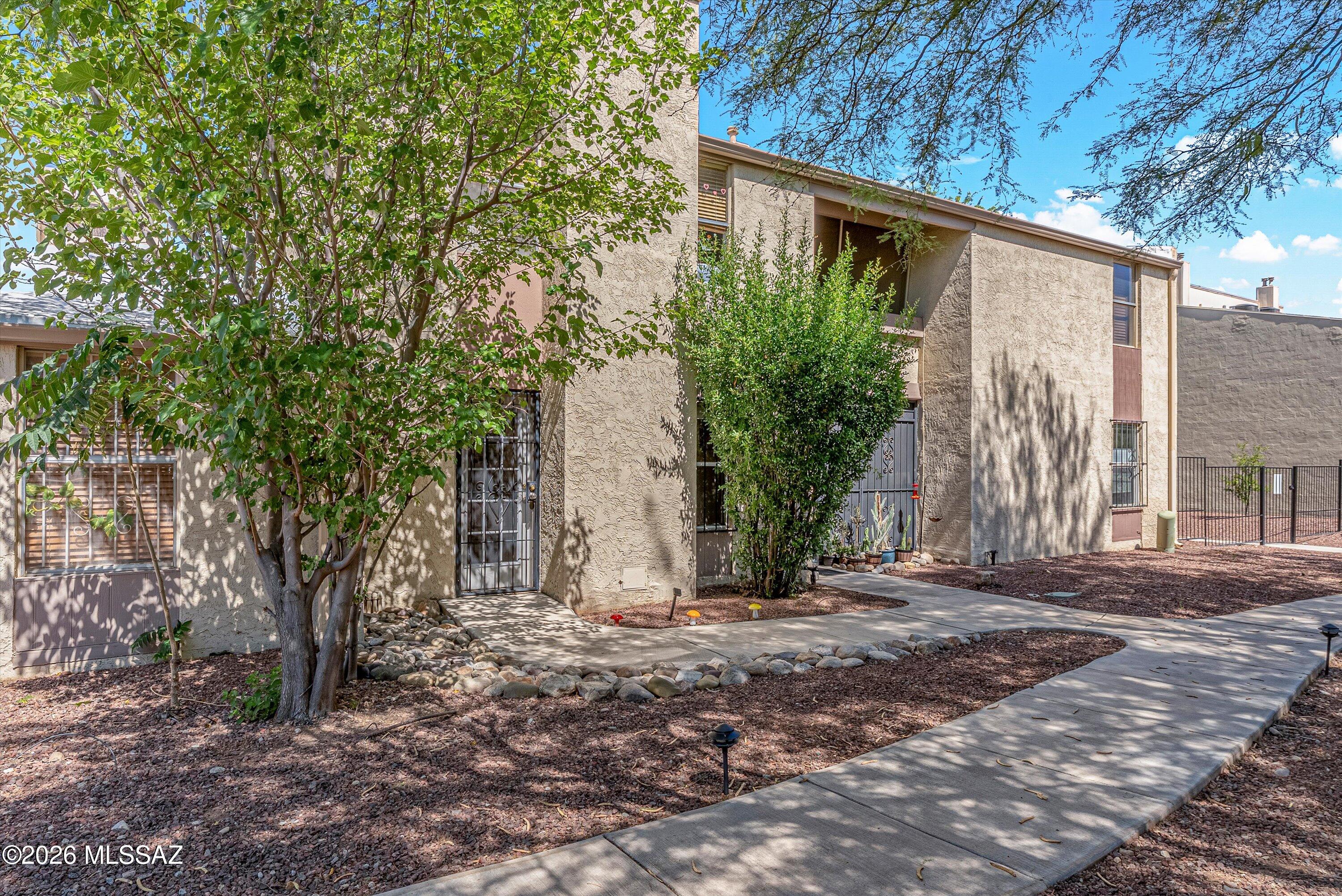 3750 North Country Club Road, Unit 5 Tucson, AZ 85716 - Photo 1 of 38 Winding paths and lots of shade welcome you home