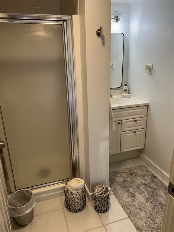 450 Rock Street, Unit 1 Fall River, MA 02720 - Photo 17 of 22 a bathroom with a sink and a mirror