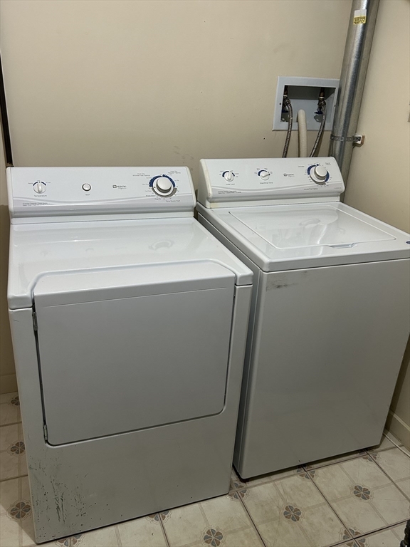 450 Rock Street, Unit 1 Fall River, MA 02720 - Photo 18 of 22 a utility room with dryer and washer
