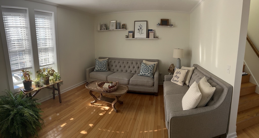 450 Rock Street, Unit 1 Fall River, MA 02720 - Photo 3 of 22 a living room with furniture and a rug