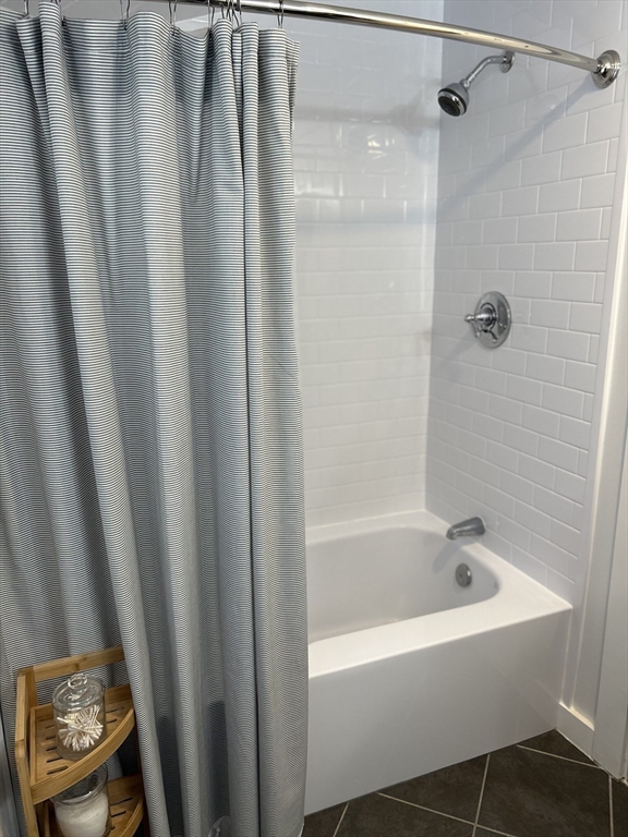 450 Rock Street, Unit 1 Fall River, MA 02720 - Photo 9 of 22 a bathroom with a bathtub and a shower