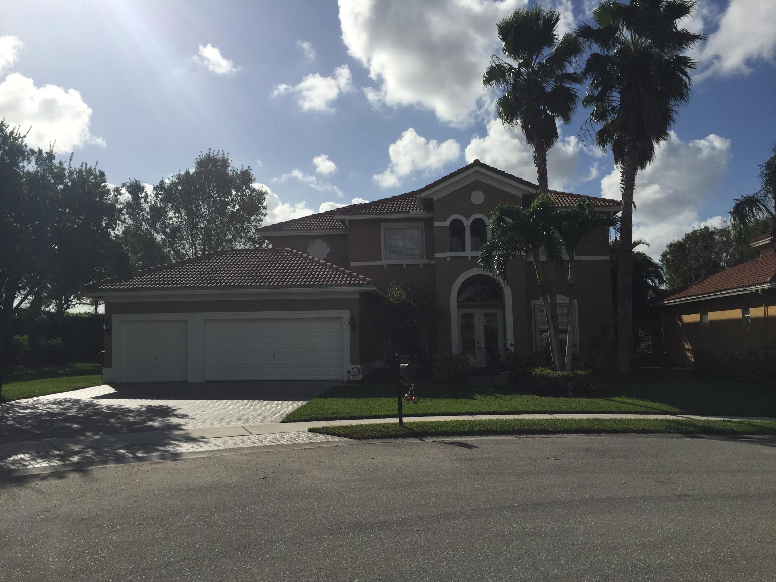 11070 Cobblefield Road Wellington, FL 33449 - Photo 2 of 19 cobbleNew front1JPG
