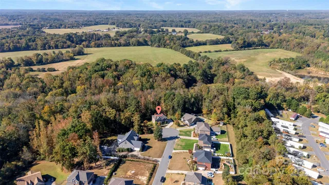 an aerial view of a city with lots of residential buildings