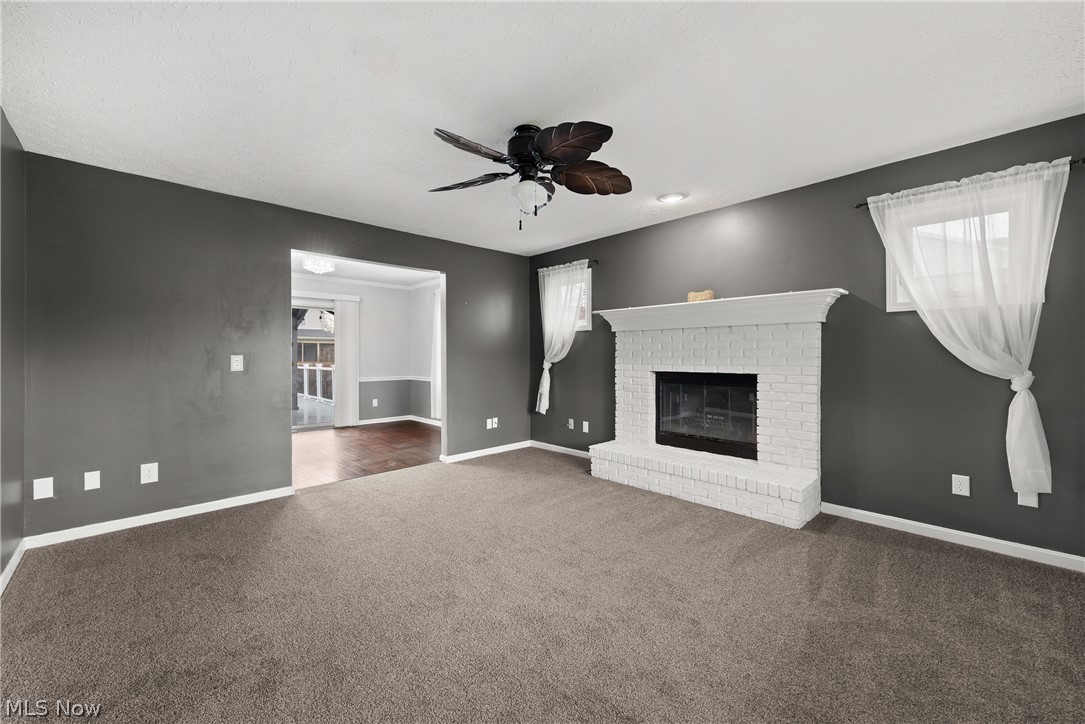33990 Harding Avenue North Ridgeville, OH 44039 - Photo 5 of 37 Living room with brick fireplace