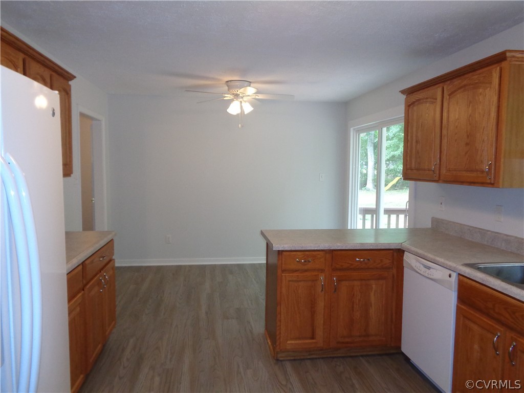 2411 Brookforest Road Midlothian, VA 23112 - Photo 7 of 24 a kitchen with a refrigerator and window