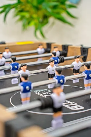 a view of a chairs and table in the patio
