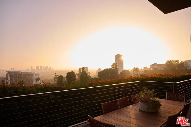 a room with gym equipment and a large window