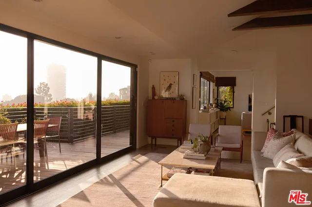 a living room with furniture and a couch