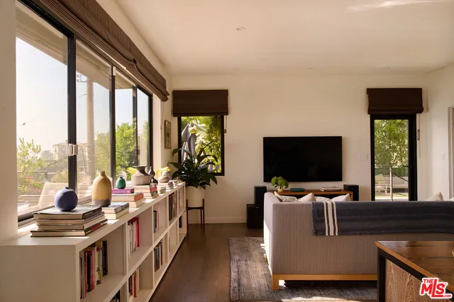 a view of a workspace with a large window