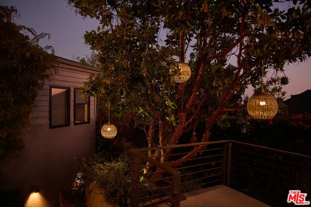 a view of balcony with furniture
