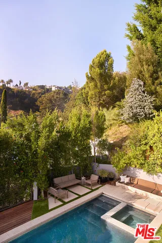 a view of balcony with sitting area