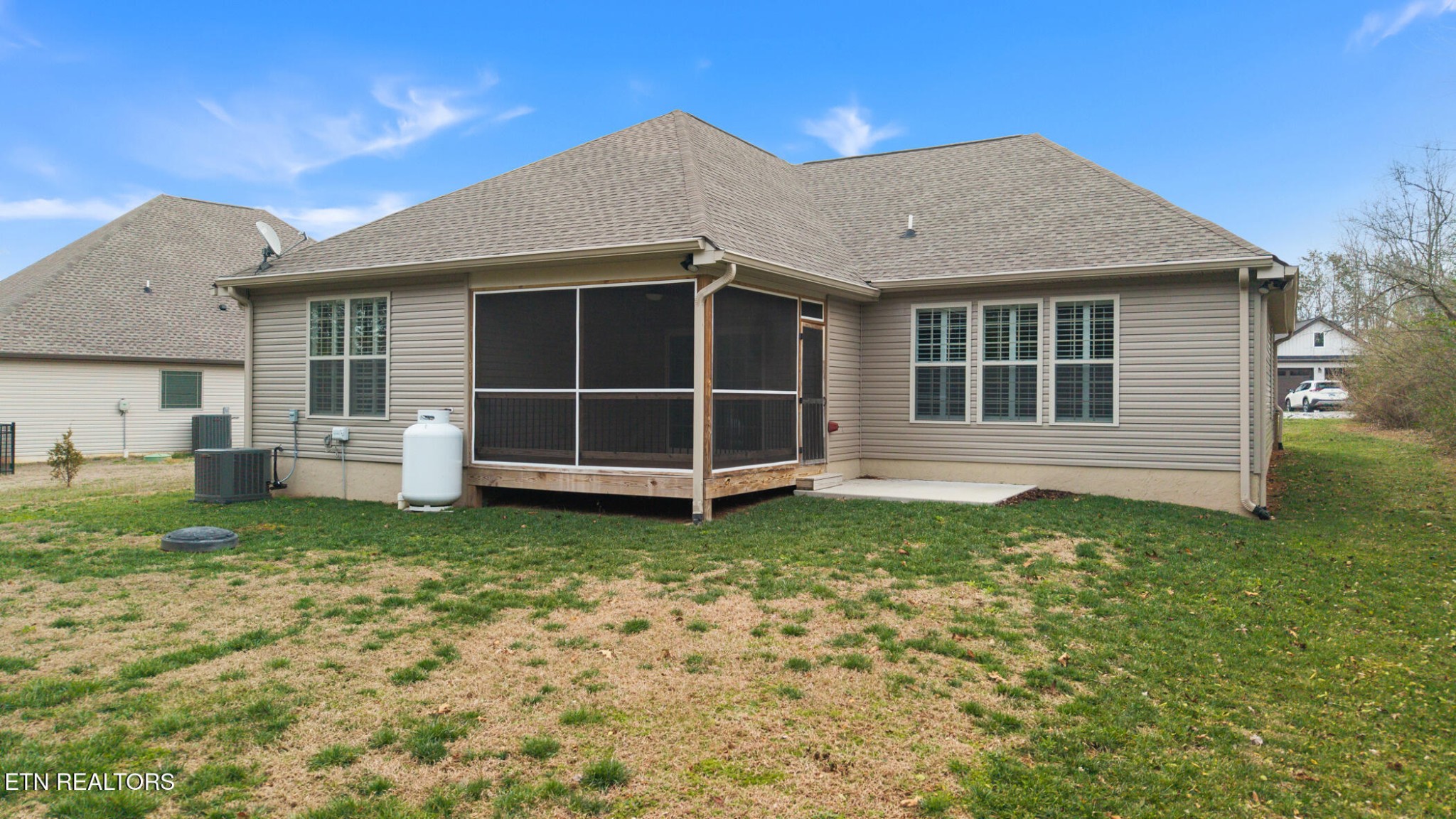 129 Ogana Way Loudon, TN 37774 - Photo 29 of 32 a house with a yard