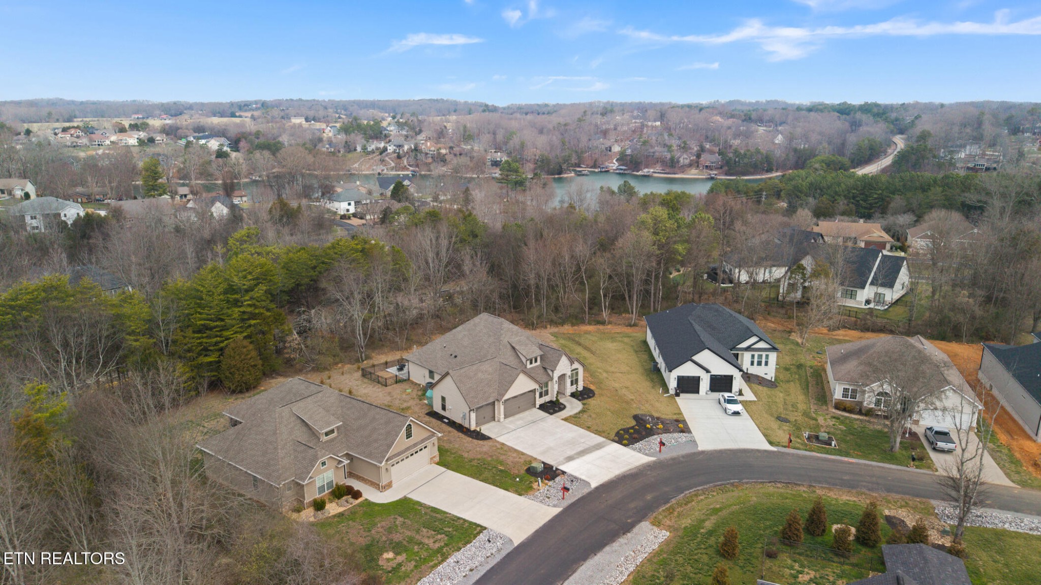 129 Ogana Way Loudon, TN 37774 - Photo 32 of 32 an aerial view of a house with a lake view