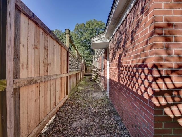 370 South Fenwick Road Memphis, TN 38111 - Photo 2 of 13 View of side of property featuring brick siding