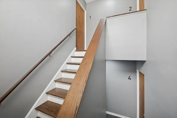 a view of entryway with wooden floor