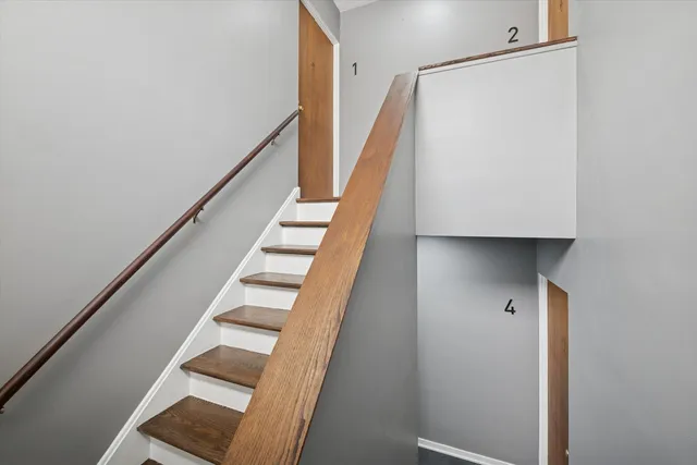 a view of entryway with wooden floor