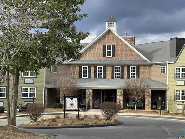 a front view of a house with garage