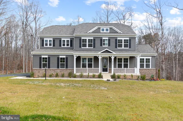 a front view of a building with swimming pool