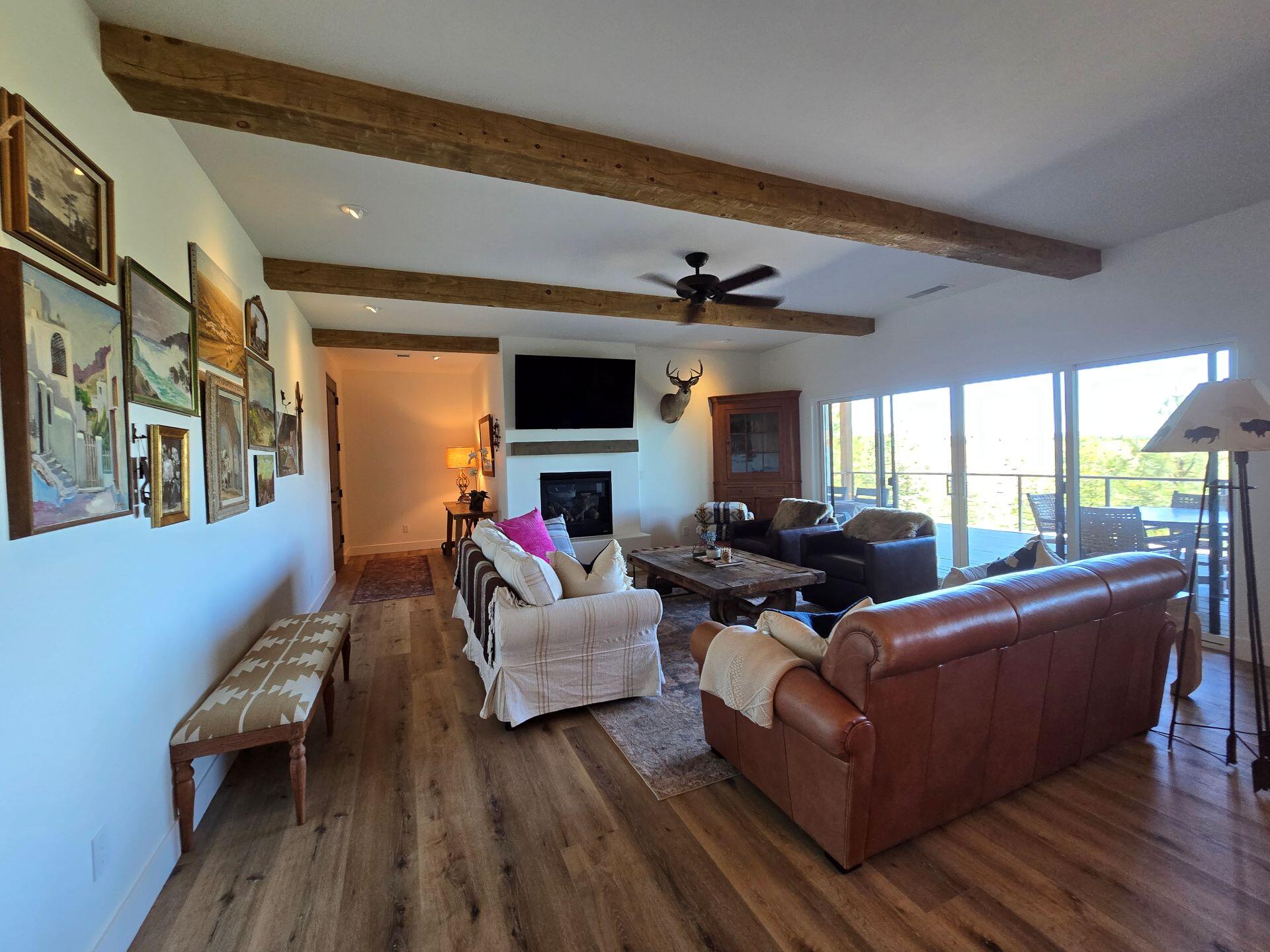 240 Rockinghorse Bend Road Payson, AZ 85541 - Photo 6 of 53 a living room with furniture and a flat screen tv