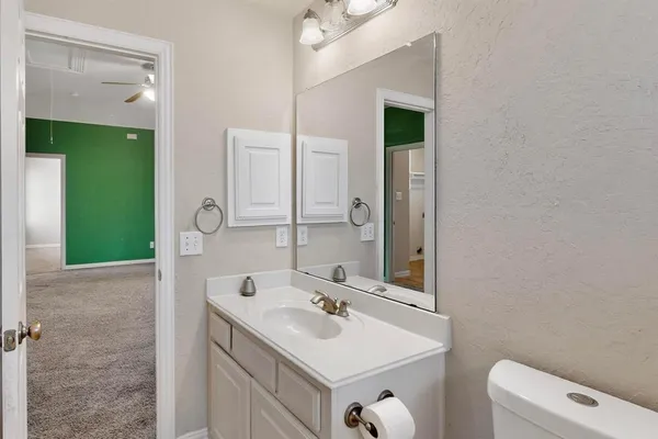 a bathroom with a sink and a toilet